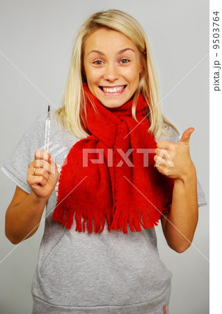 Happy sick young woman with thermometer Happy sick young woman with thermometer 9503764