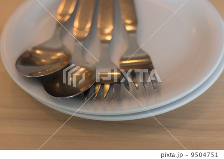 spoon on dish spoon on dish 9504751
