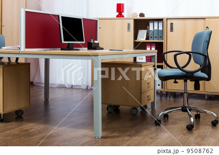 a monitor on desk 9508762