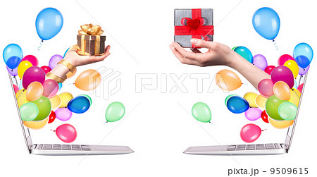 hand with a gift and laptop 9509615