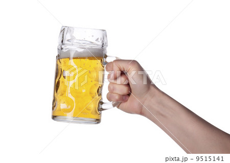 hand holding beer making a toast hand holding beer making a toast 9515141