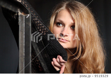 Young woman in black 9519329