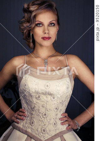 Beautiful bride in a luxury wedding dress Beautiful bride in a luxury wedding dress 9520150