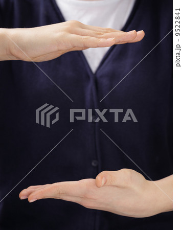 female teen hands to presenting or showing something 9522841