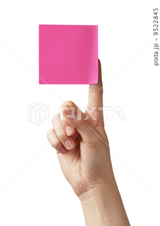 female teen hand holding purple sticky note 9522845
