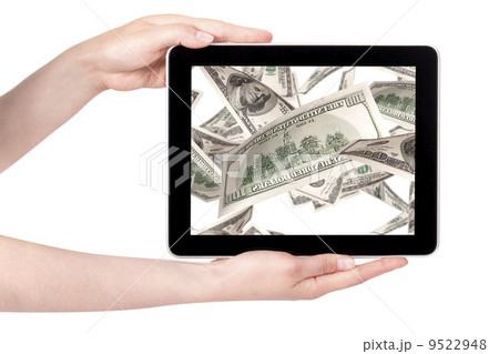 lot of money on a Tablet pc screen lot of money on a Tablet pc screen 9522948