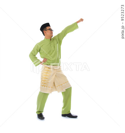malay male jumping celebrating hari raya eid fitr after ramadan 9523273