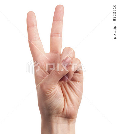 Hand showing the sign of victory and peace 9523516
