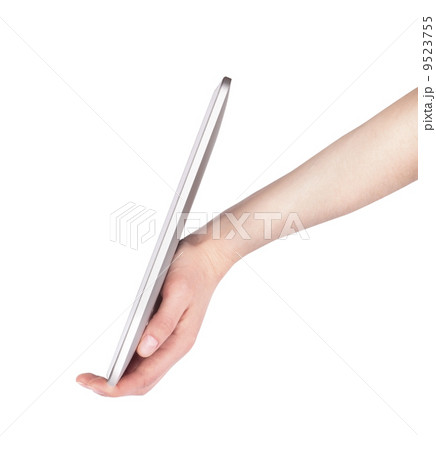 side view of tablet computer with hand 9523755