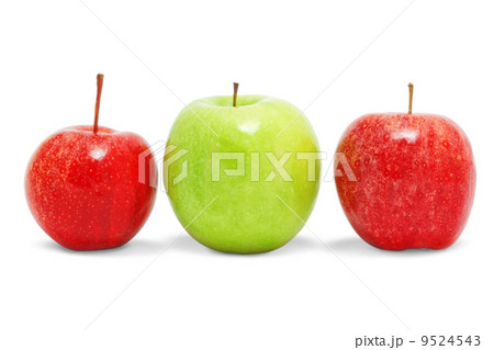 Two red and one green apple. On a white background. Two red and one green apple. On a white background. 9524543