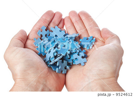 Stack of puzzles palms on a white background. 9524612