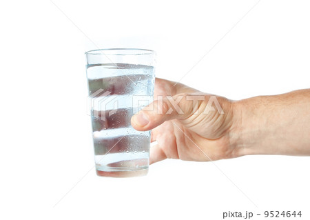 A glass of pure water in hand. A glass of pure water in hand. 9524644