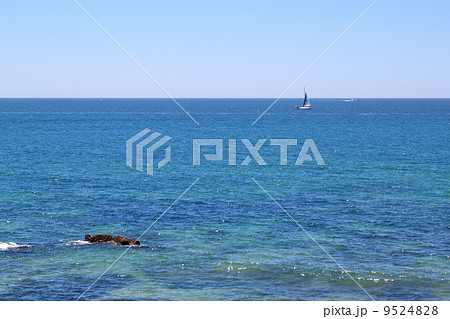 Portuguese sailing ship on a blue sea. 9524828