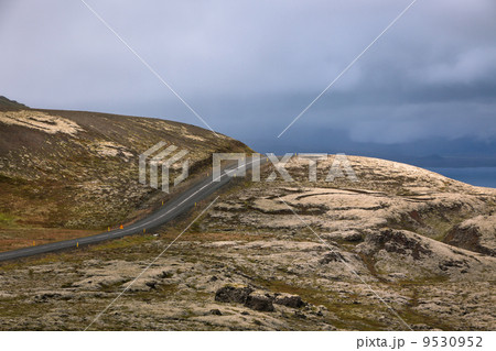Highway through Iceland landscape at overcast day Highway through Iceland landscape at overcast day 9530952