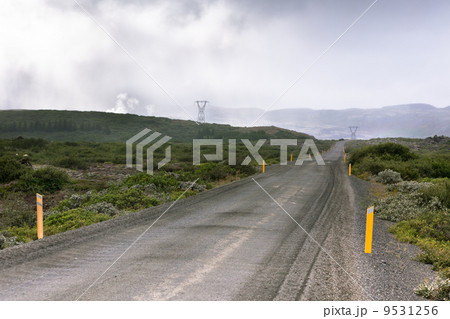Gravel Road through Geothermal Area in Iceland Gravel Road through Geothermal Area in Iceland 9531256
