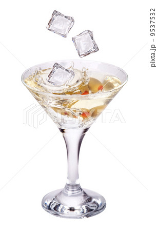 martini with olive and ice splashing martini with olive and ice splashing 9537532