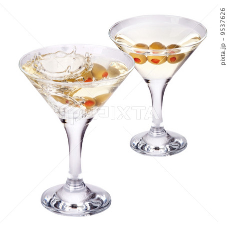 martini with olive splashing isolated 9537626