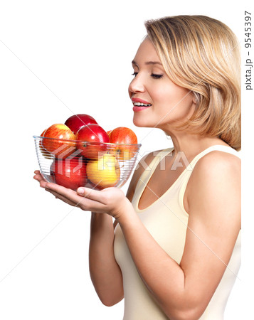Portrait of a young woman with apples. Portrait of a young woman with apples. 9545397