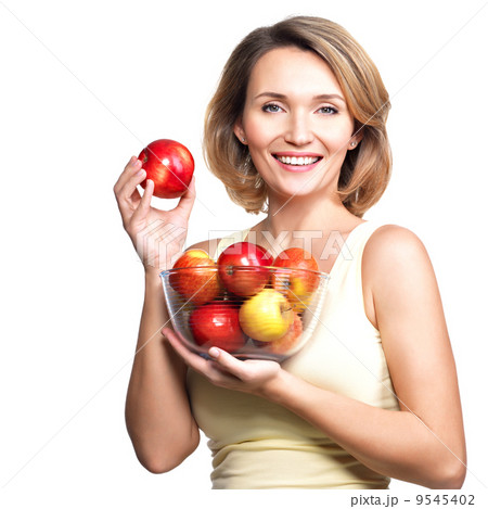 Portrait of a young woman with apples. 9545402