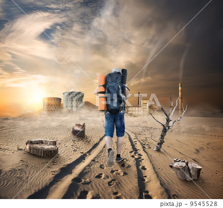 Tourist in a sandy desert Tourist in a sandy desert 9545528