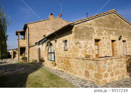The garden of a luxury country house in the famous Tuscan hills, Italy. The garden of a luxury country house in the famous Tuscan hills, Italy. 9557239