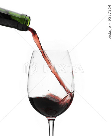Red wine pouring down from a wine bottle 9557554