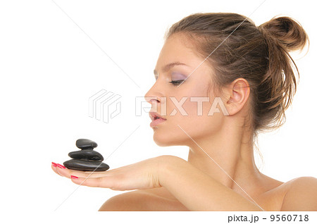 woman holding stones on the palm of your hand woman holding stones on the palm of your hand 9560718