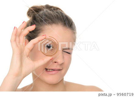 Young woman holds spiral aromas 9560719
