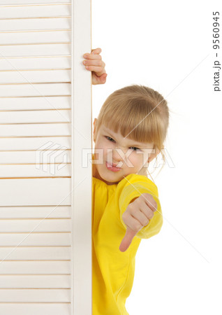 Dissatisfied girl in yellow jacket 9560945