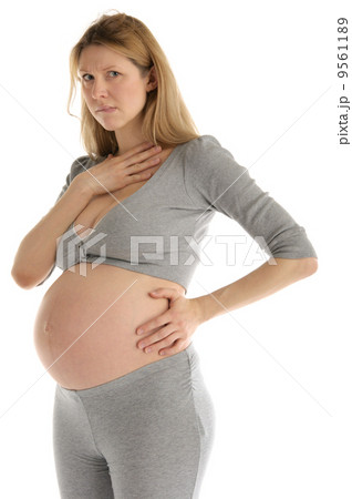 offended pregnant woman in gray suit offended pregnant woman in gray suit 9561189