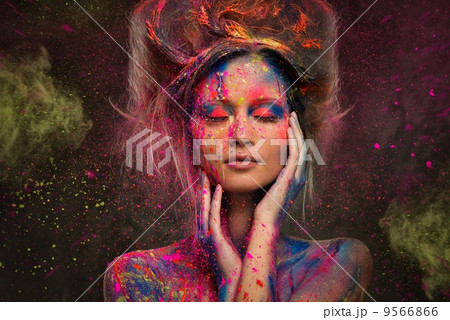 Young woman muse with creative body art and hairdo 9566866