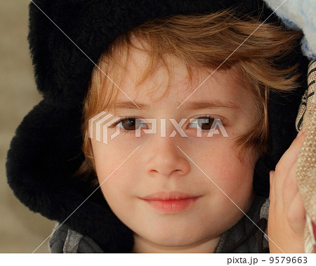 Portrait of a beautiful boy in winter hat Portrait of a beautiful boy in winter hat 9579663
