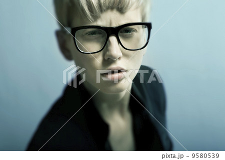 beautiful young blonde girl with glasses 9580539