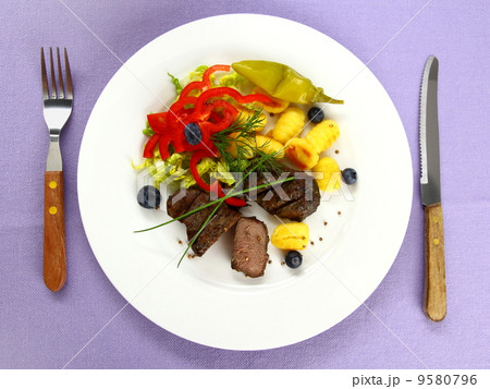 Lamb steak with gnocchi, red peppers and spices Lamb steak with gnocchi, red peppers and spices 9580796