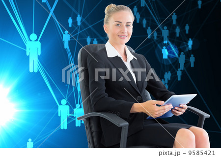 Composite image of businesswoman sitting on swivel chair with ta Composite image of businesswoman sitting on swivel chair with ta 9585421