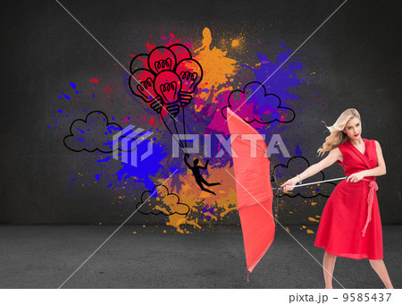 Composite image of elegant blonde holding umbrella 9585437