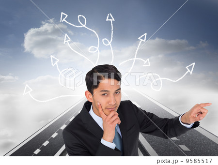 Composite image of thoughtful asian businessman pointing Composite image of thoughtful asian businessman pointing 9585517