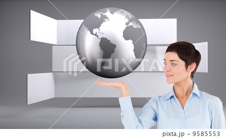 Composite image of businesswoman with an open hand to show a cop 9585553