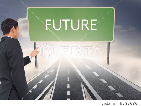 Composite image of serious asian businessman pointing 9585686