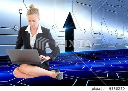 Composite image of businesswoman using laptop Composite image of businesswoman using laptop 9586250