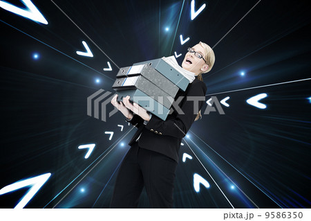 Composite image of businesswoman carrying folders 9586350