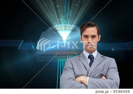 Composite image of young businessman looking at camera 9586409
