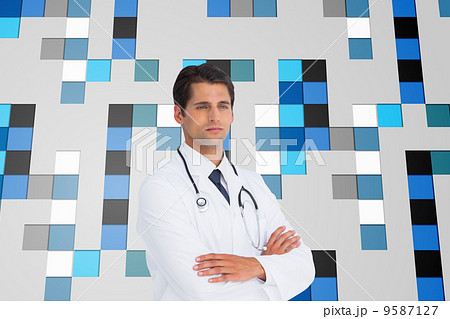 Composite image of serious doctor with arms crossed 9587127