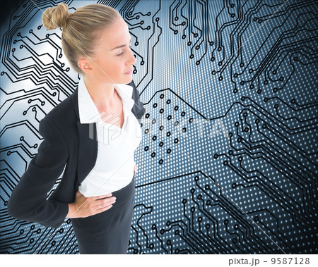 Composite image of businesswoman standing with hands on hips Composite image of businesswoman standing with hands on hips 9587128
