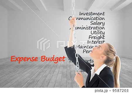 Composite image of businesswoman pulling a chain 9587203