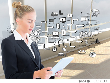 Composite image of businesswoman holding tablet 9587213