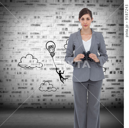 Composite image of young businesswoman with binoculars 9587243