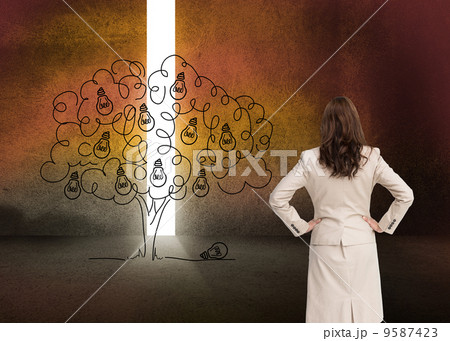 Composite image of businesswoman standing back to camera 9587423