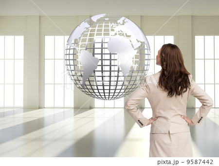 Composite image of businesswoman standing back to camera Composite image of businesswoman standing back to camera 9587442