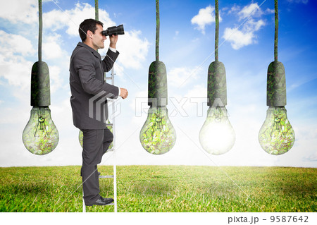 Composite image of businessman standing on ladder Composite image of businessman standing on ladder 9587642